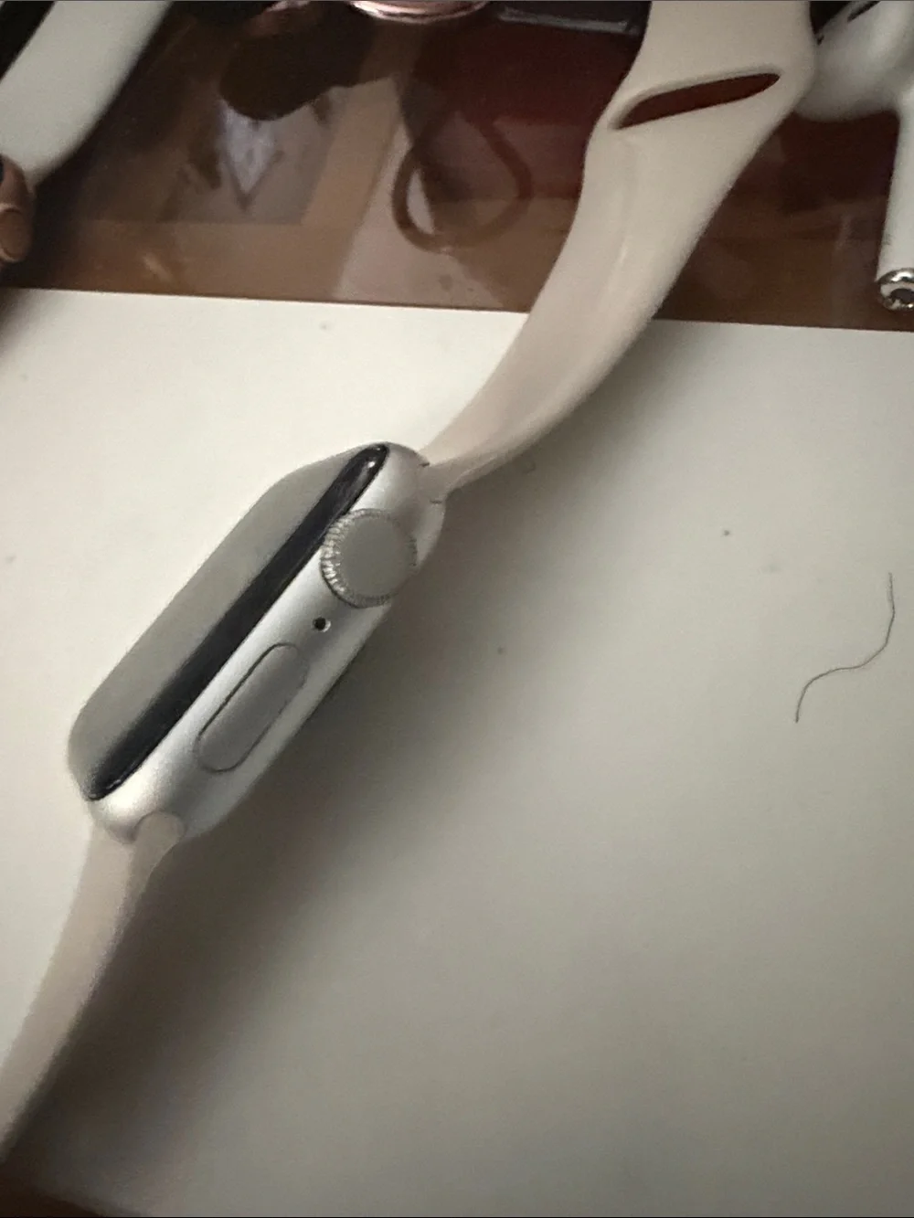 Apple Smartwatch with Beige Silicone Band and Silver Case